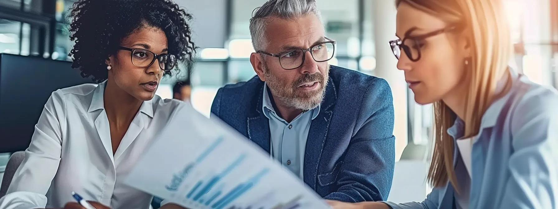 a diverse group of professionals carefully reviewing a detailed financial risk assessment report in a modern office boardroom.